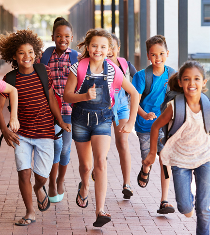 School kids running in hallway