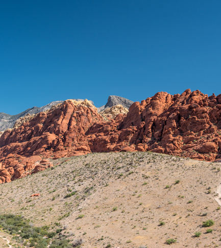 Red sandstone against a blue sky.