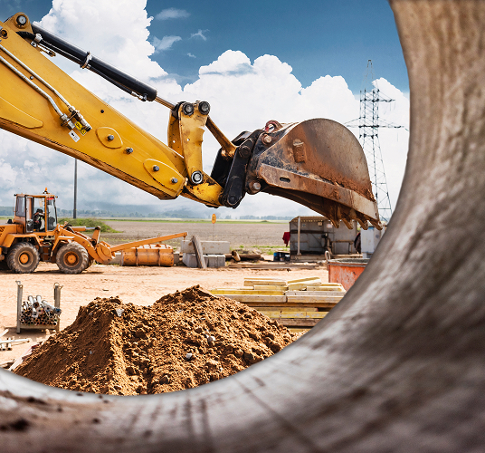 Excavator digs piles. Earthworks for the construction of the foundation. Construction equipment for the device of piles.