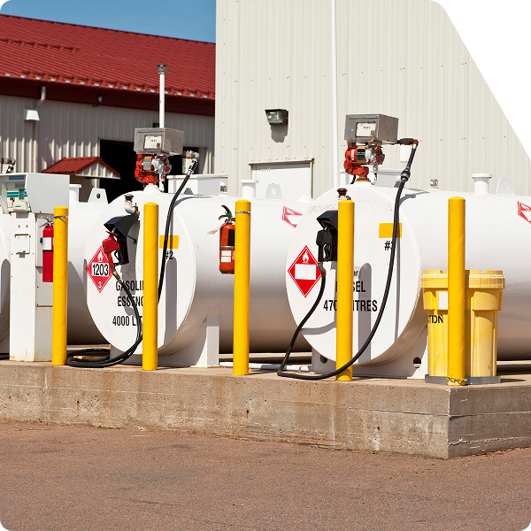 Aboveground fuel tanks in secondary containment, showing proper labeling and compliance