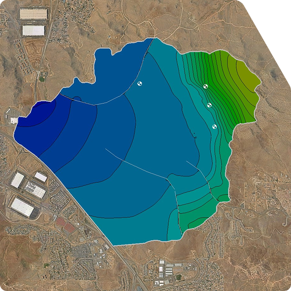 Groundwater contours of varying colors overlain on aerial photograph of city adjacent areas.