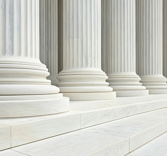A row of classical columns with steps